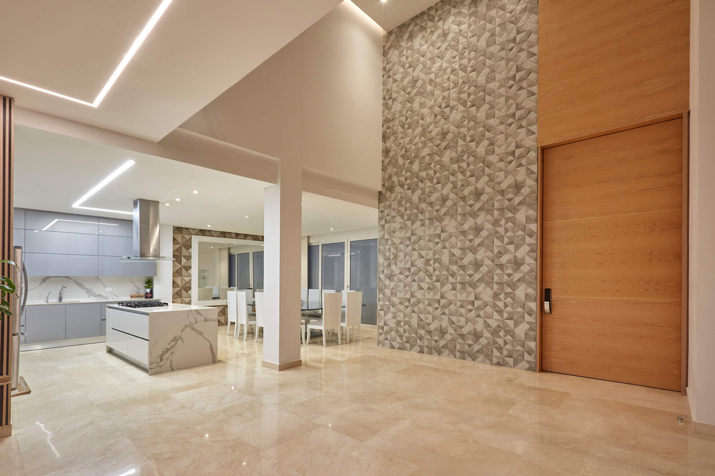 Cocina abierta con acabados premium y diseño contemporáneo en Casa Monserrat 1A, Cartagena.